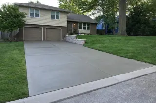 Modern wide concrete driveway with clean lines